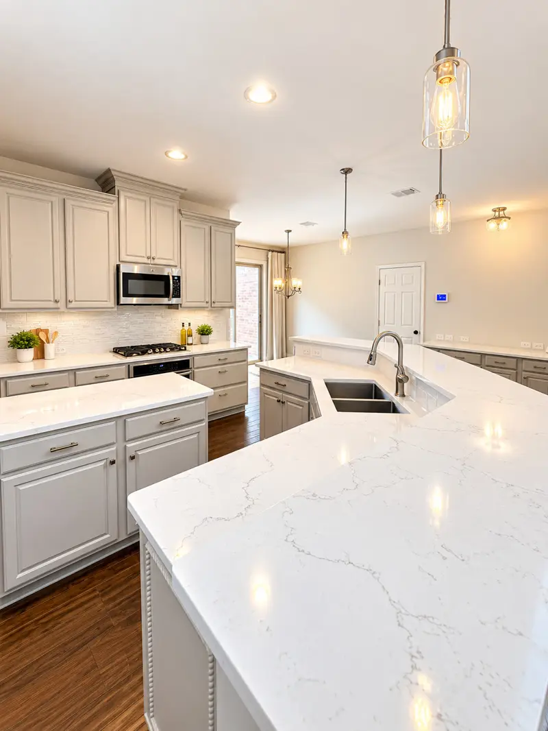 Polished kitchen counters and detailed cooking area